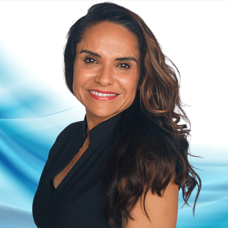 Smiling woman with long dark hair in a black blouse, posing against a blue abstract background.