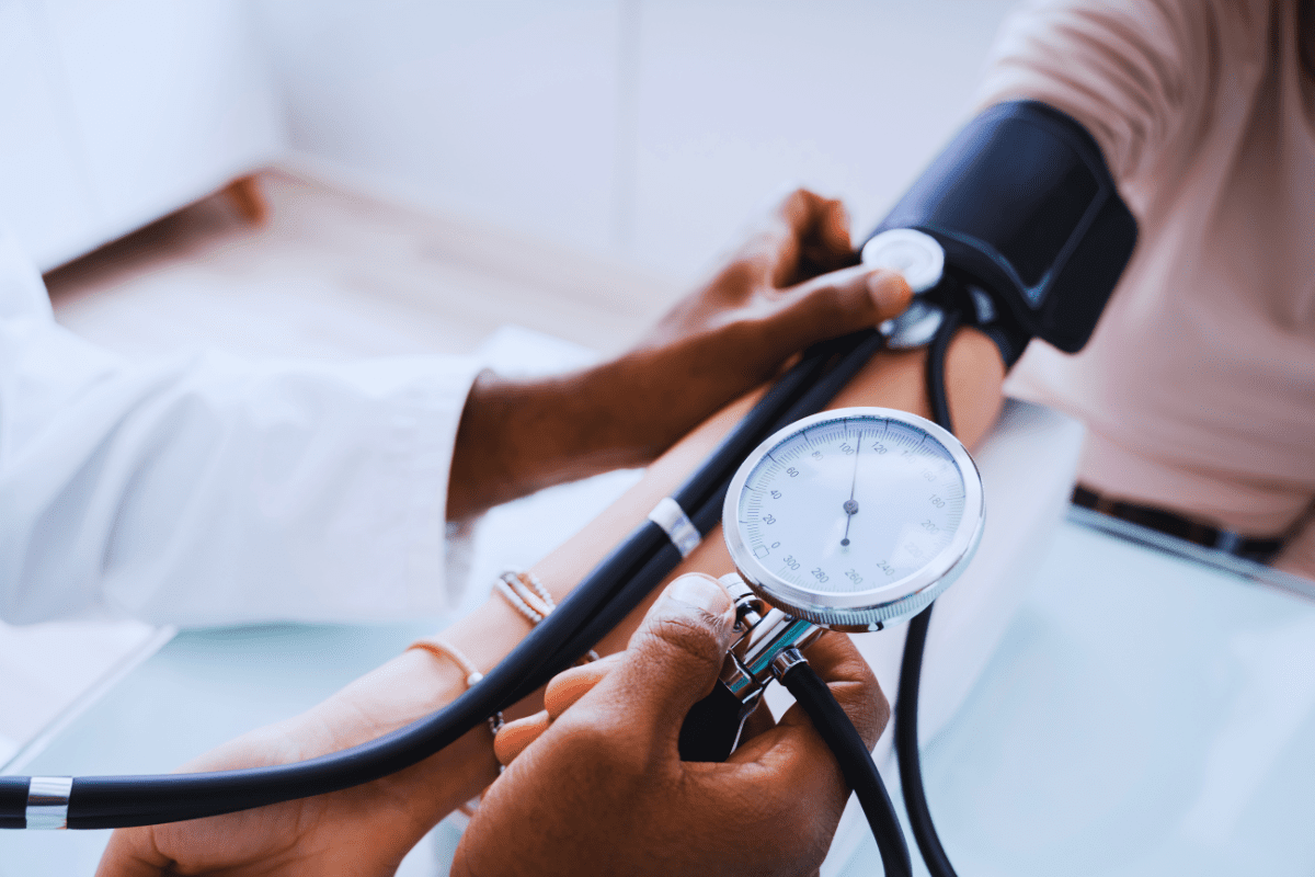 patient having blood pressure taken