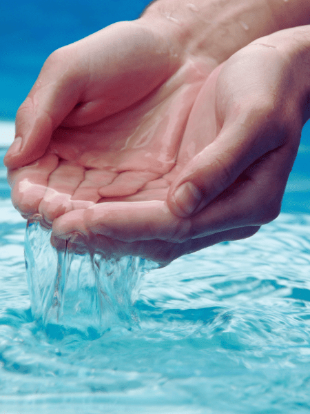 hands scooping fresh water